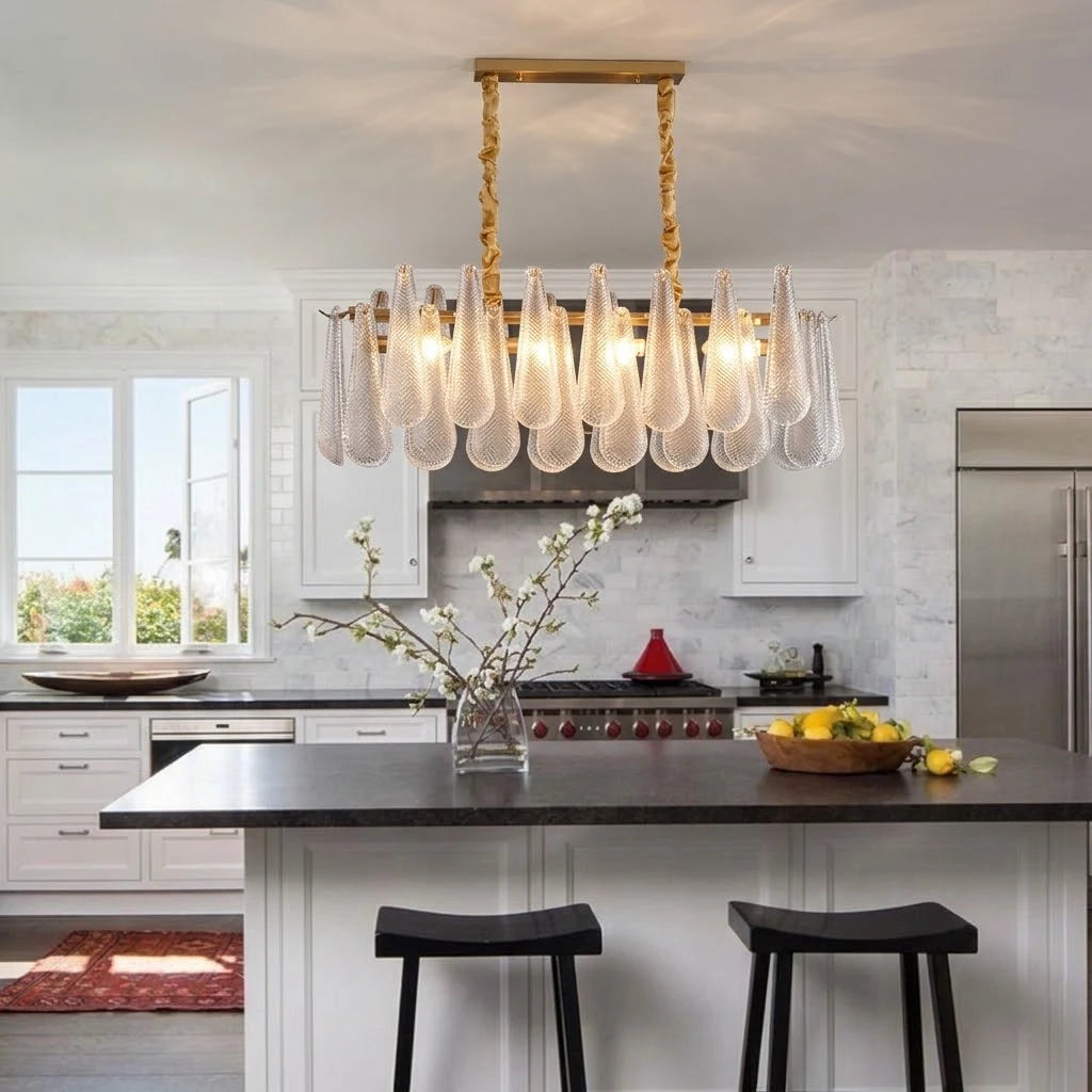 Modern Brass Linear Chandelier Over Kitchen Island