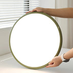 Hands Holding Modern Green Ultra-Thin Round Ceiling Light Fixture