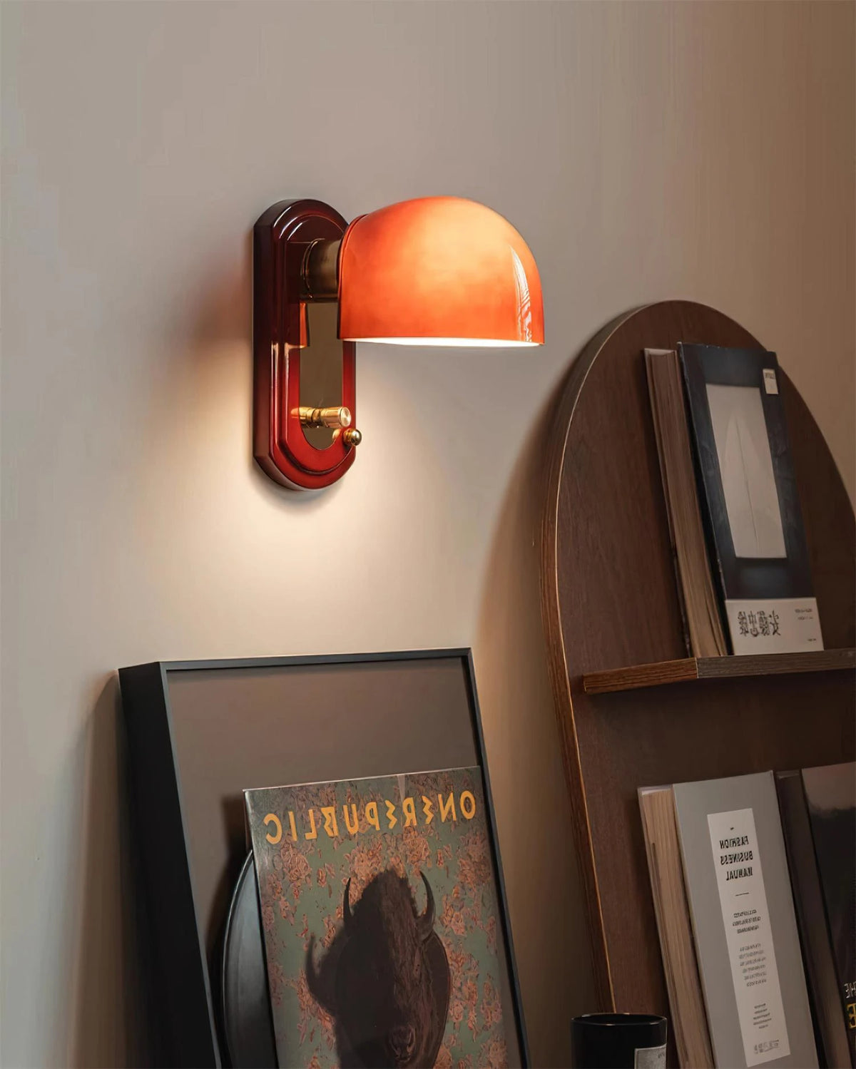 Mid Century Orange Wall Light Over Living Room Art Display
