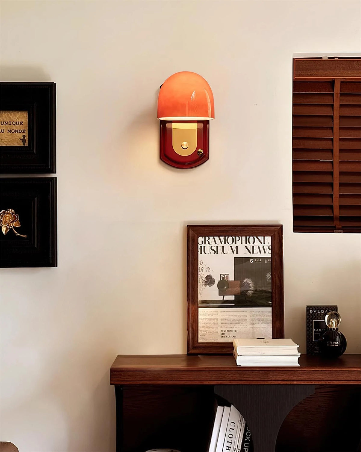 Vintage Orange Wall Sconce Over Living Room Console Table