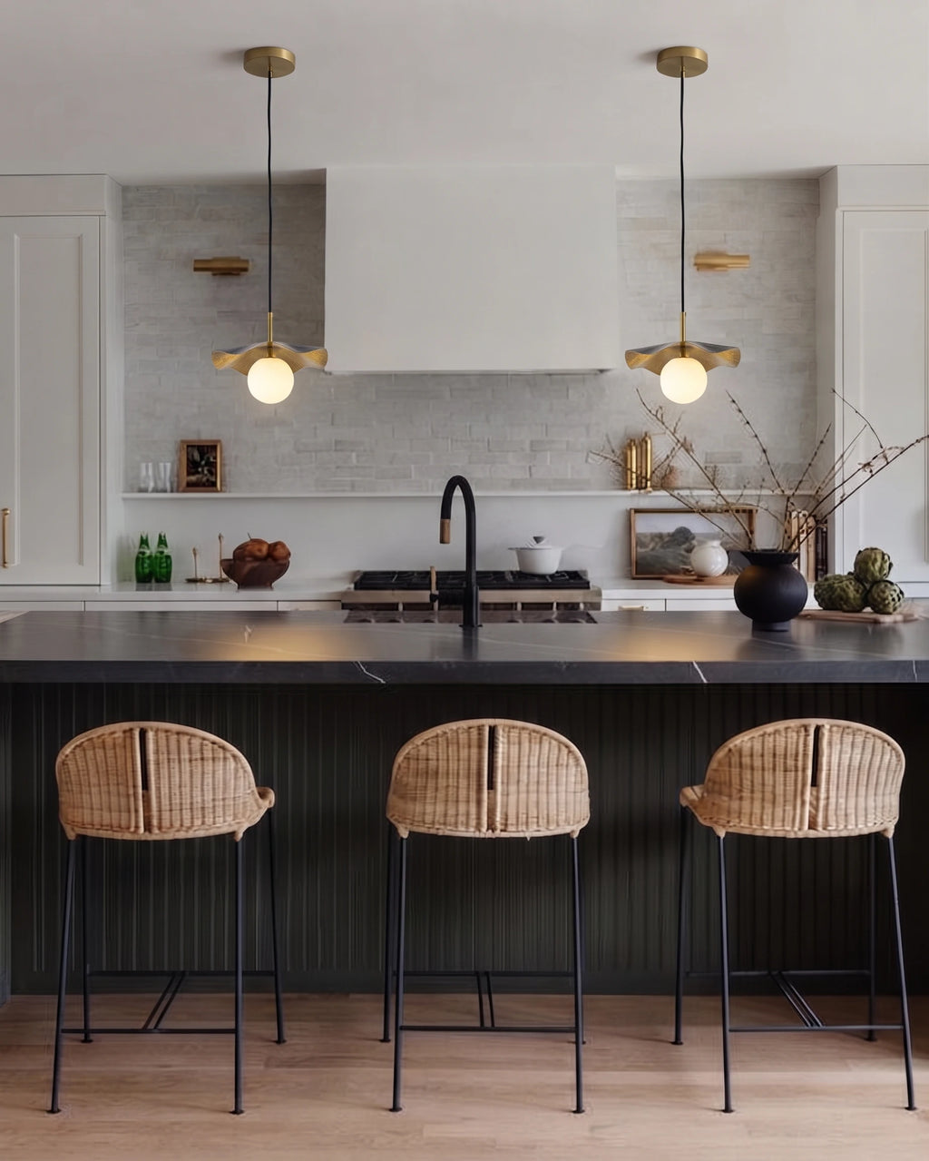 Modern Black and Gold Pendant Lights Over Kitchen Island