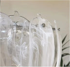 Close Up View of Petal Glass Arrangement and Chandelier Hardware