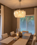 Modern Petal Art Glass Chandelier Over Dining Table in Evening