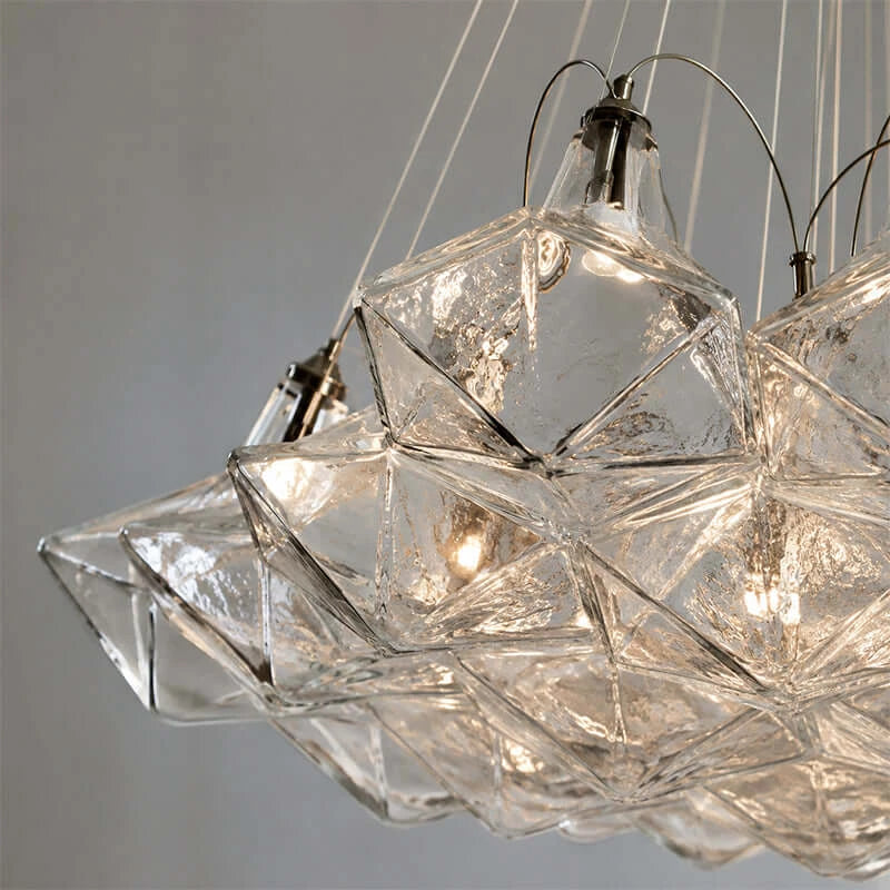 Close Up View of Geometric Faceted Art Glass Shades and Internal Bulbs
