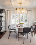 Modern Faceted Glass Ceiling Light Over Round Dining Table