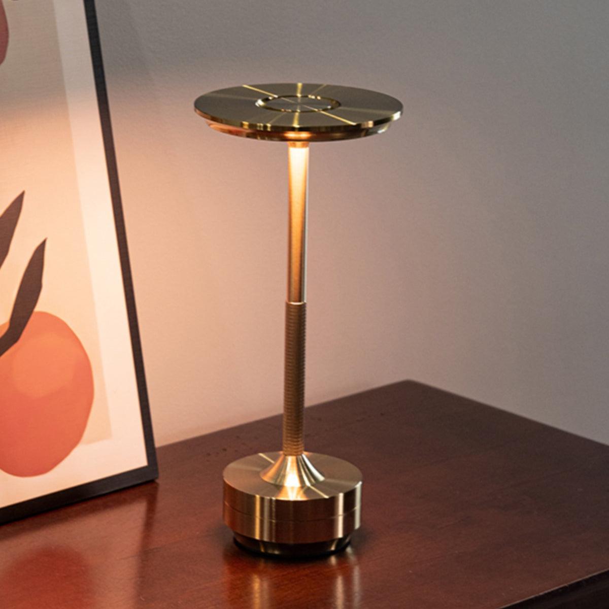 Lit Turn Craft rechargeable table lamp on desk warm brick wall interior