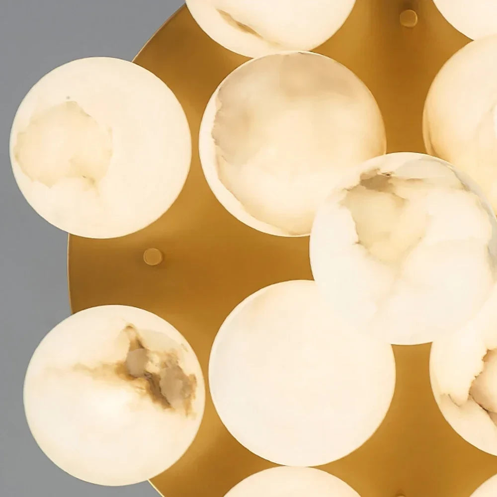 Close Up View of Alabaster Spheres and Brass Canopy