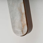 Close Up View of Alabaster Cylinder and Leather Edge Detail