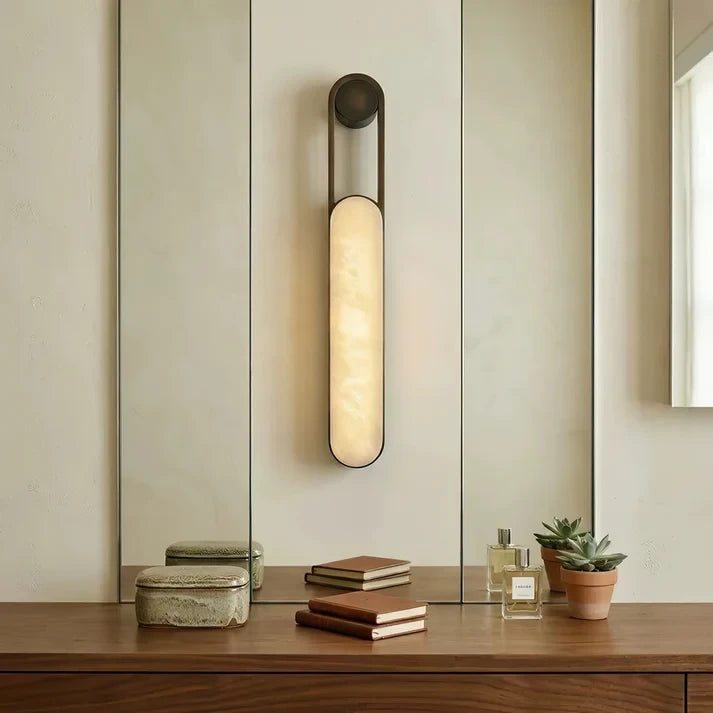 Modern Alabaster Cylinder Wall Sconce Over Console Table