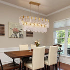 Modern Cascading Petal Art Glass Linear Chandelier Over Wooden Dining Table