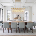 Modern Cascading Petal Art Glass Linear Chandelier Over Dining Room Table