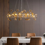 Modern Amber Ginkgo Leaf Chandelier Over Dining Table