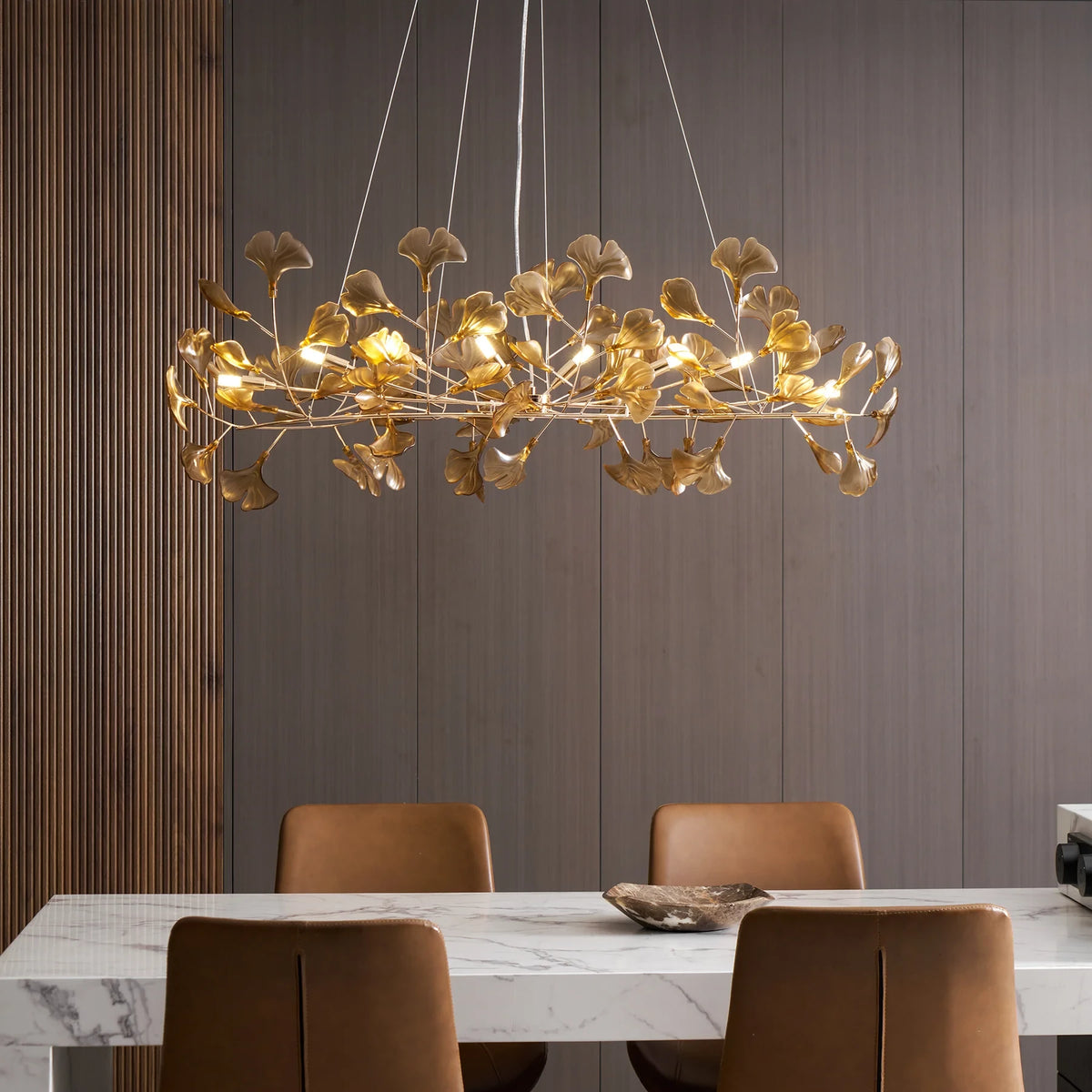 Modern Amber Ginkgo Leaf Chandelier Over Dining Table