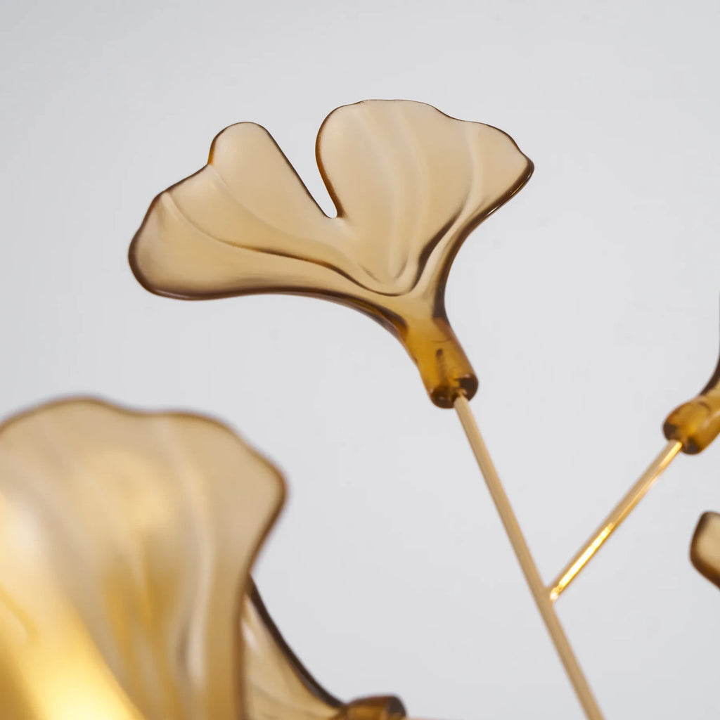 Close Up View of Illuminated Amber Ginkgo Leaf Art Glass