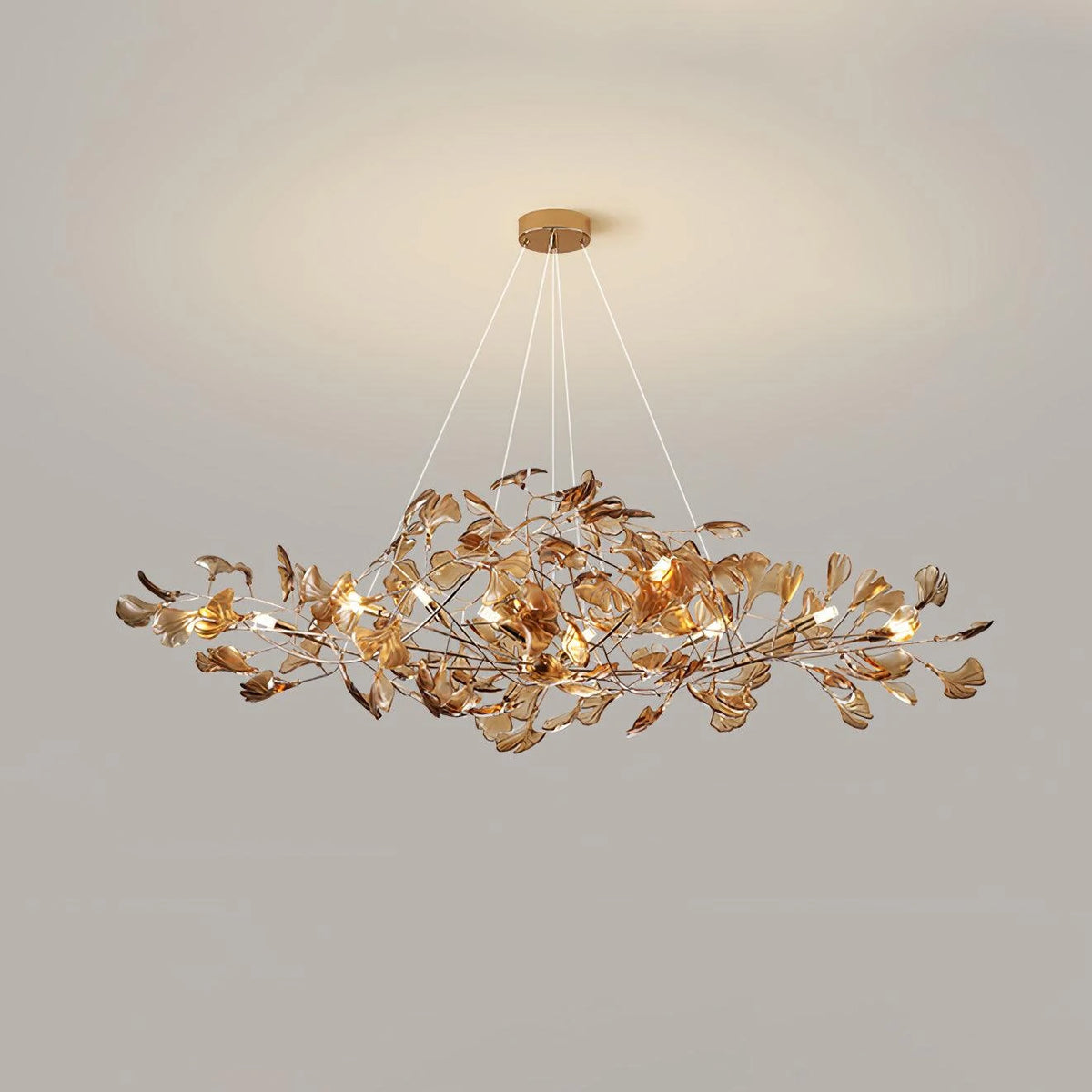 Angled View of Illuminated Modern Amber Ginkgo Leaf Chandelier