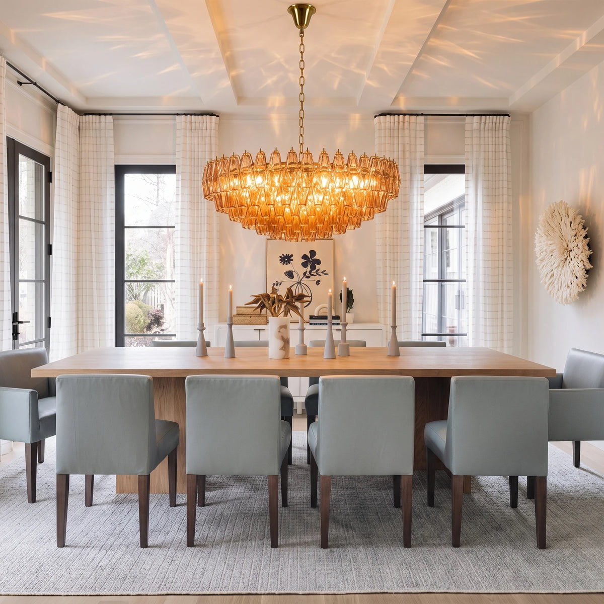 Modern Pink-Orange Faceted Art Glass Chandelier Over Dining Room Table