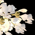 Close Up View of Illuminated White Ginkgo Leaf Petals and Gold Branch Structure
