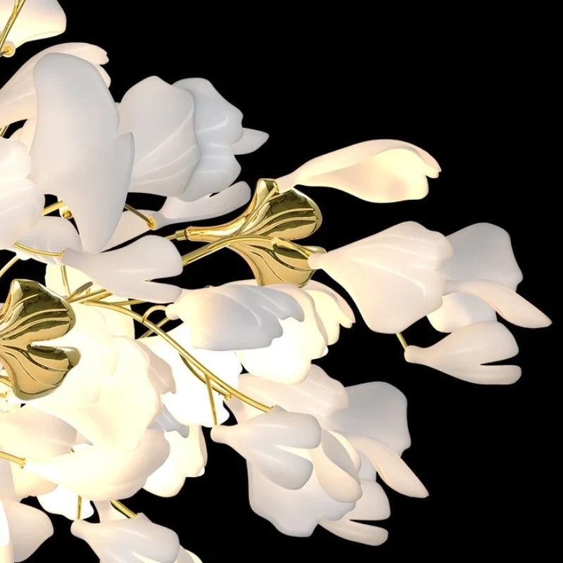 Close Up View of Illuminated White Ginkgo Leaf Petals and Gold Branch Structure