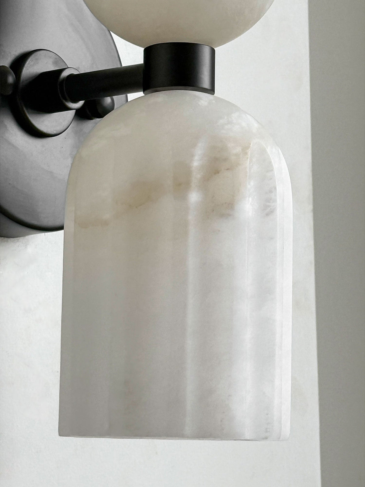 Close Up View of Black Mount Base and Fluted Alabaster Shade