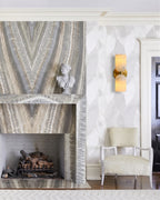 Modern Alabaster Wall Sconce Beside Fireplace Setting