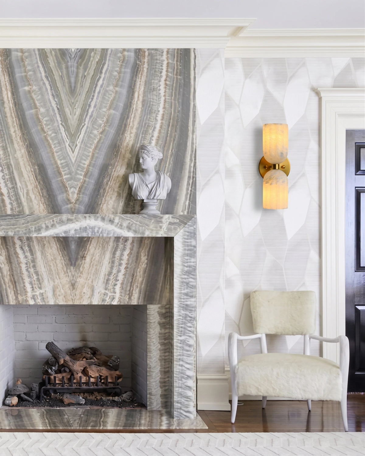 Modern Alabaster Wall Sconce Beside Fireplace Setting
