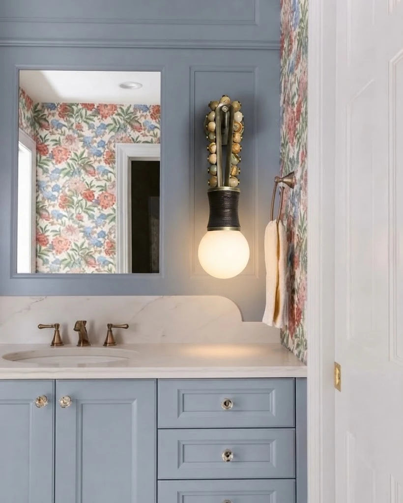 Modern Brass Bead Wall Sconce Over Bathroom Vanity