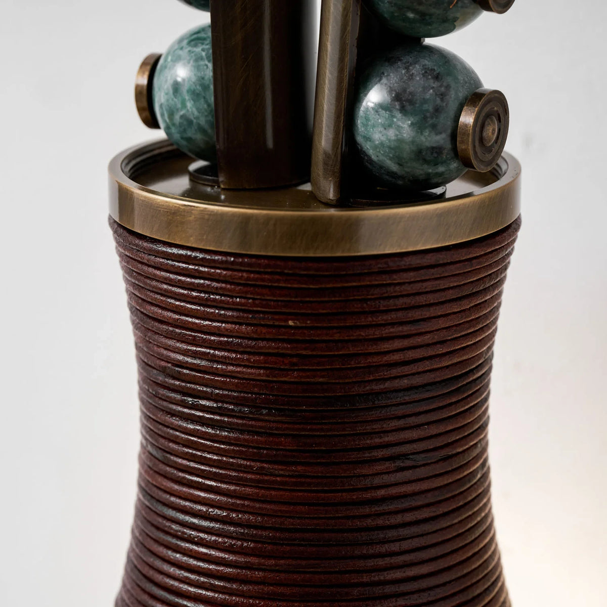 Close Up View of Leather Wrapped Base Texture and Brass Details