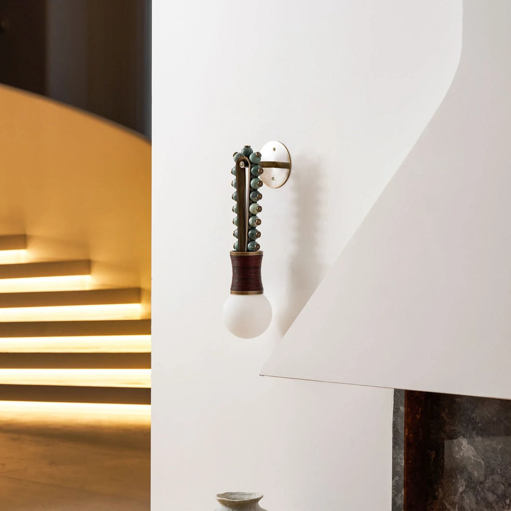 Modern Brass Bead Wall Sconce in Grand Staircase Foyer