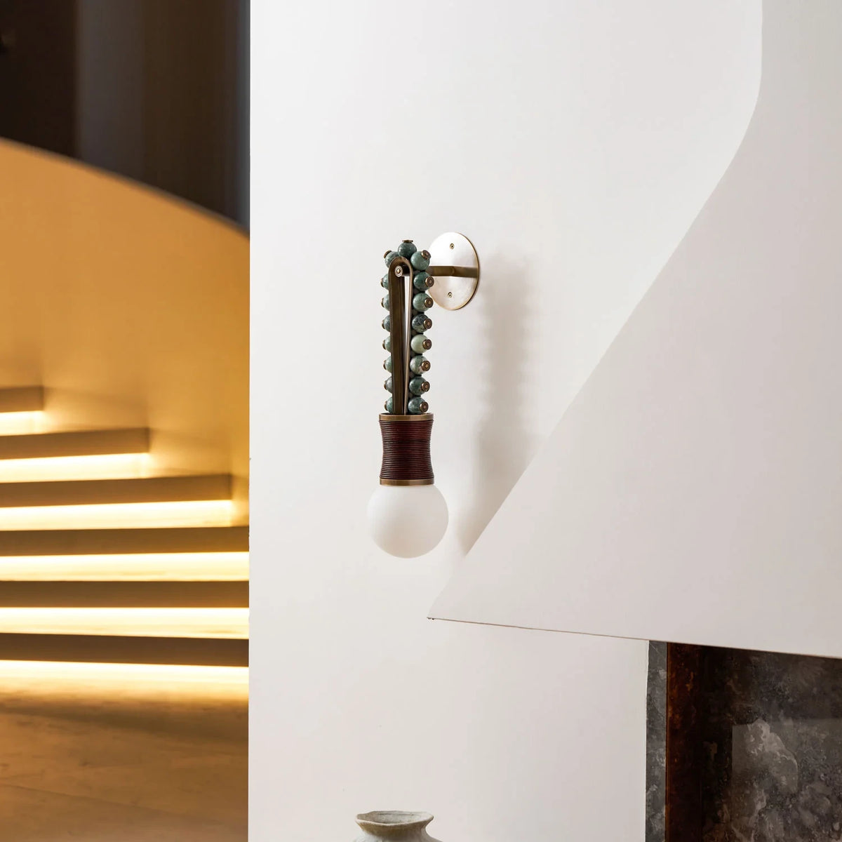 Modern Brass Bead Wall Sconce in Grand Staircase Foyer