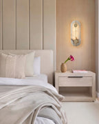 Modern Alabaster Oval Wall Sconce in Master Bedroom Setting
