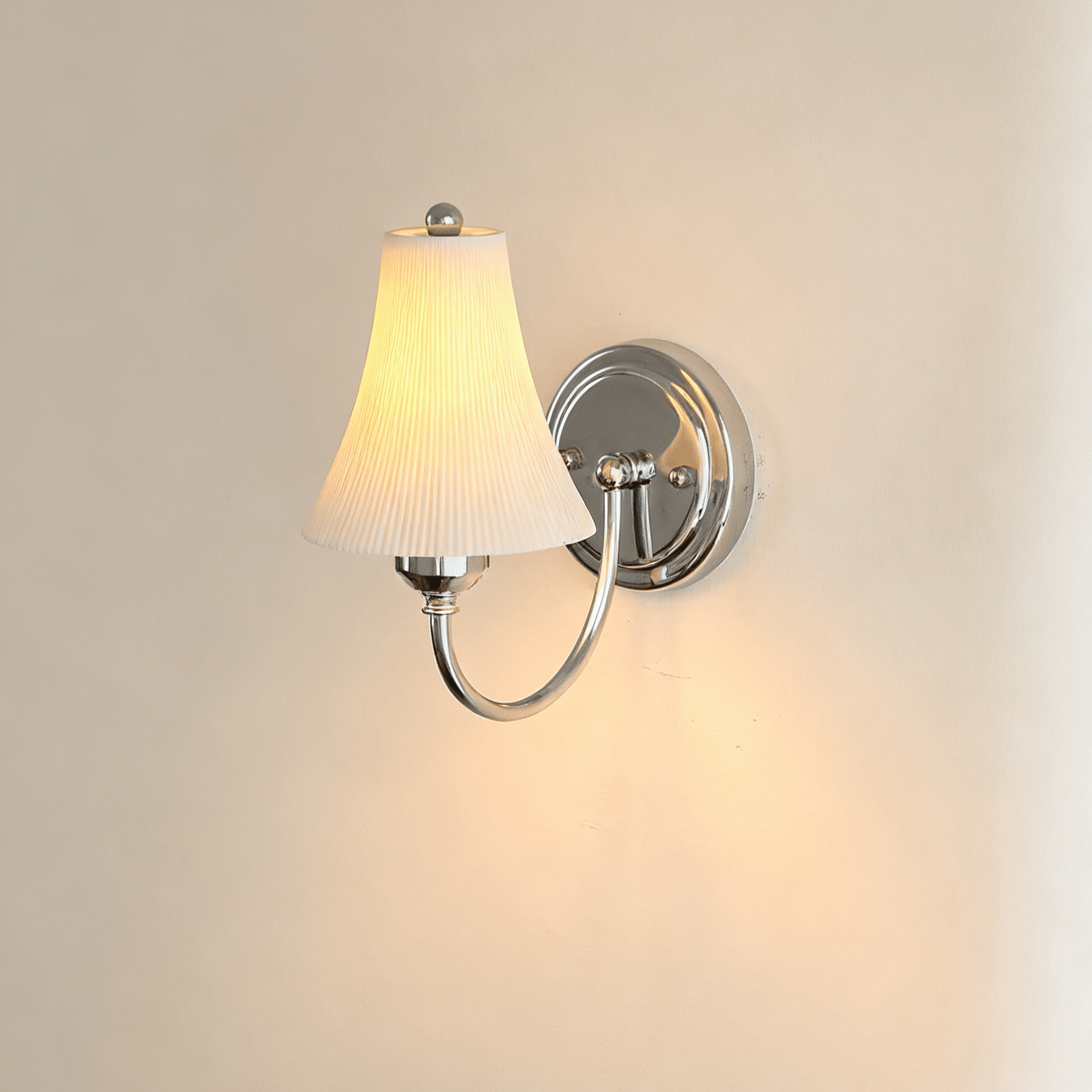 Illuminated Chrome Pleated Porcelain Wall Sconce Studio Display