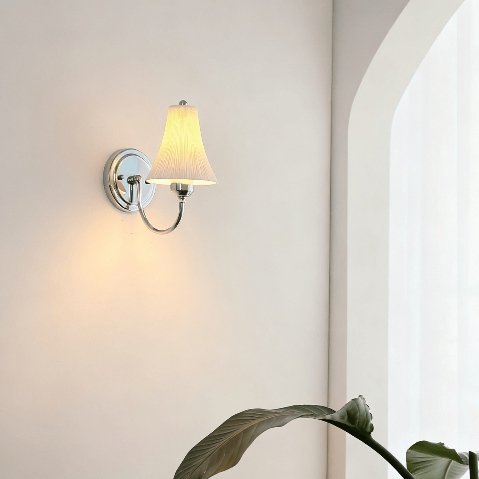 Pleated Porcelain Wall Sconce Installed in Modern Corner Space