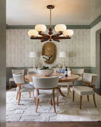 Modern Pleated Glass Chandelier Over Round Dining Table