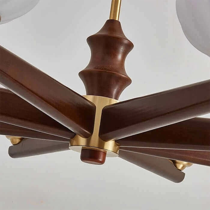 Close Up View of Wood Branch Frame and Brass Canopy Center