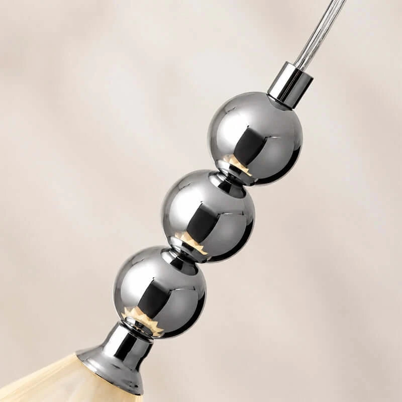 Close Up View of Suspension Rod and Metal Bead Accents