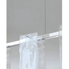 Close Up View of Linear Glass Shades and Metal Rod Connection