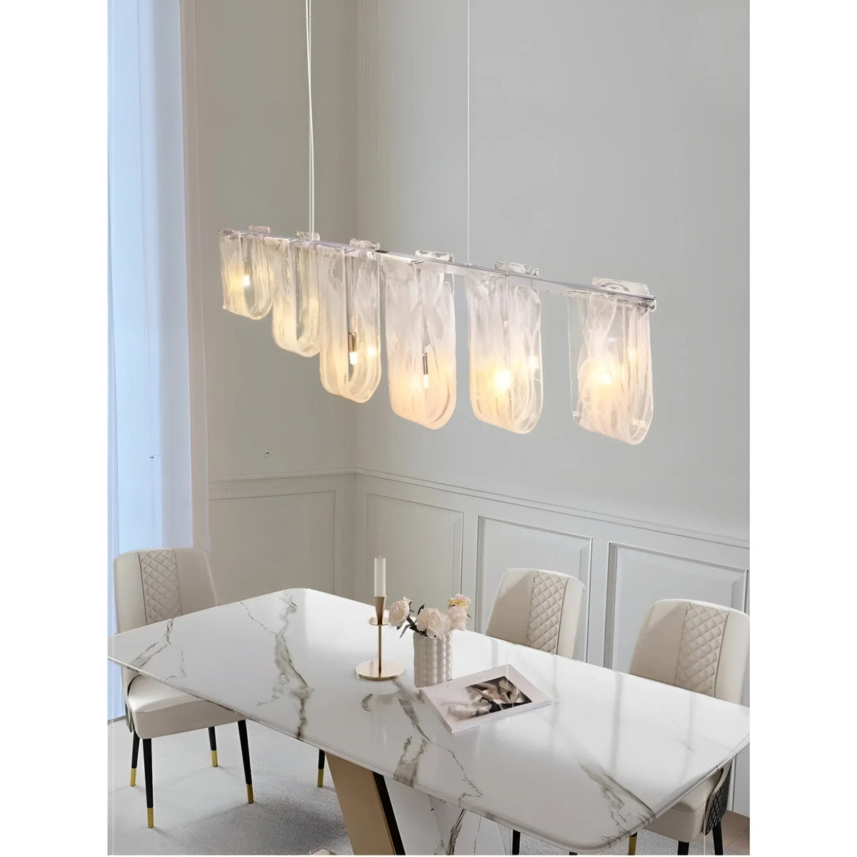 Modern Linear Glass Pendant Light in Cozy Interior Setting