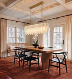 Modern Brass Linear Fringe Chandelier in Elegant Dining Space