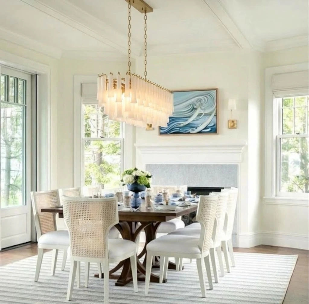 Modern Brass Linear Fringe Chandelier in Bright Dining Setting