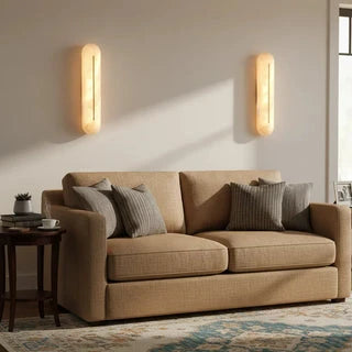 Pair of Capsule Alabaster Sconces Flanking Living Room Sofa
