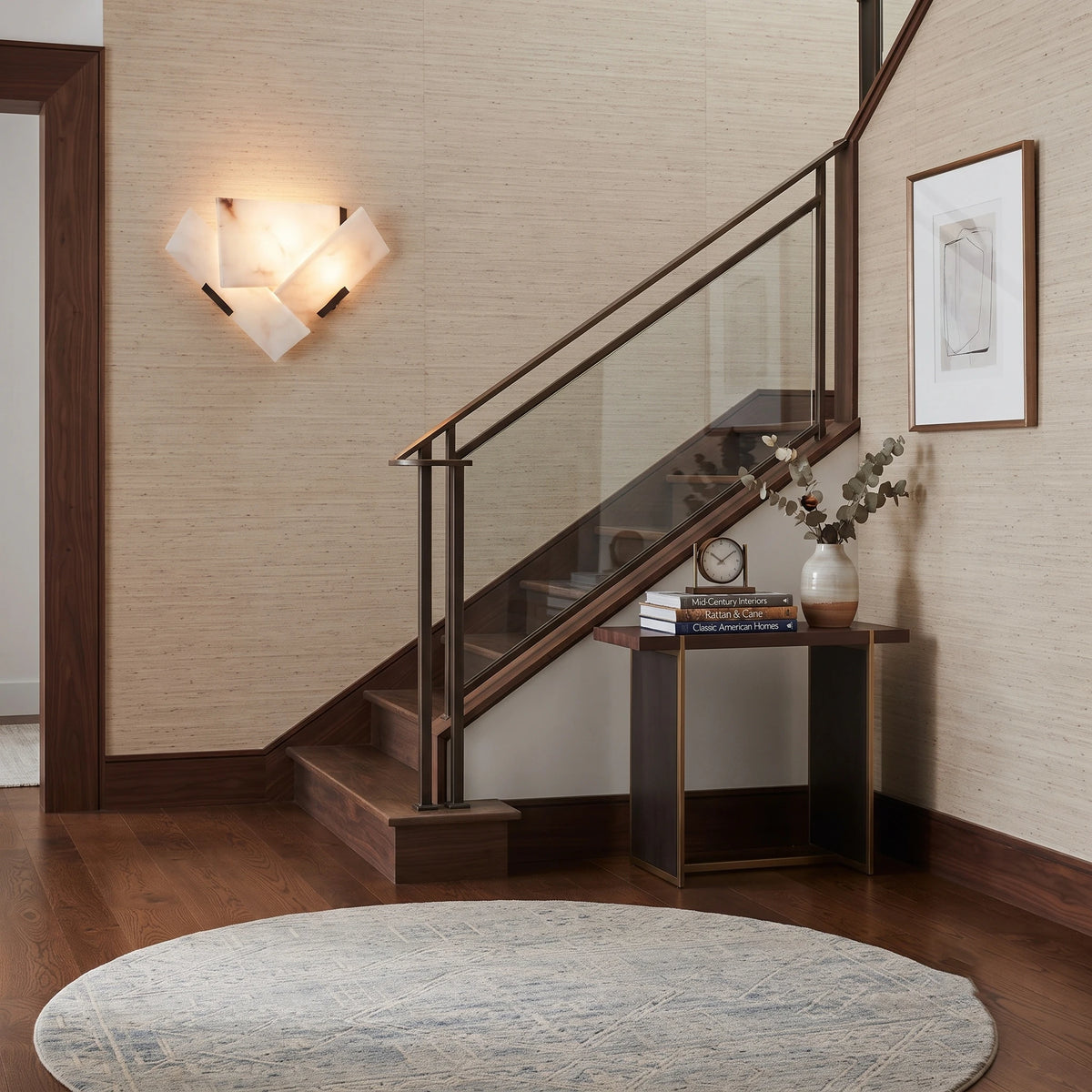 Modern Alabaster Wall Light Installed in Foyer near Staircase