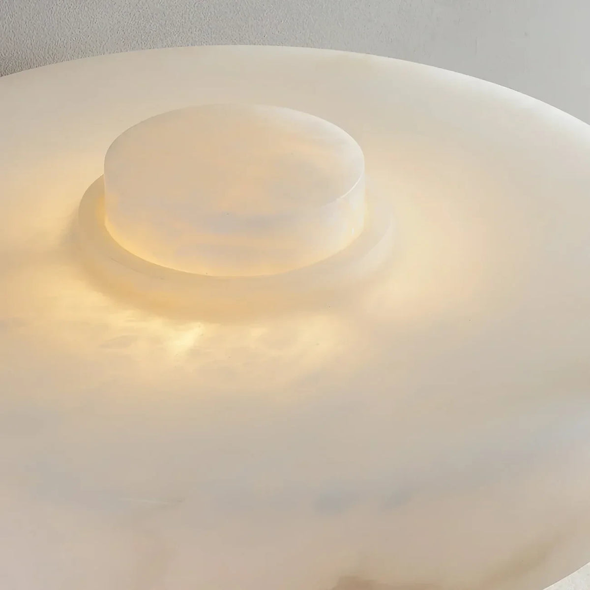 Close Up View of Glowing Alabaster Disc Shade and Top Detail