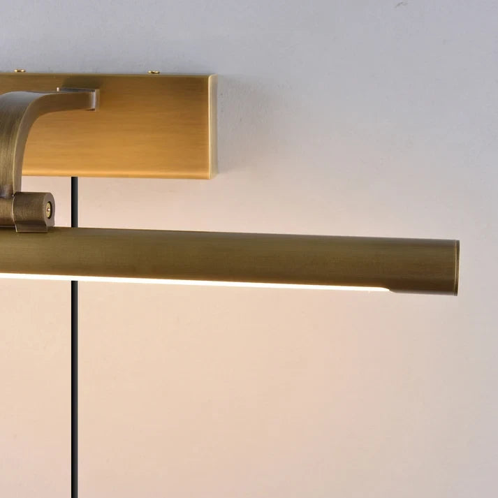 Close Up View of Illuminated Brass Picture Light Studio Display