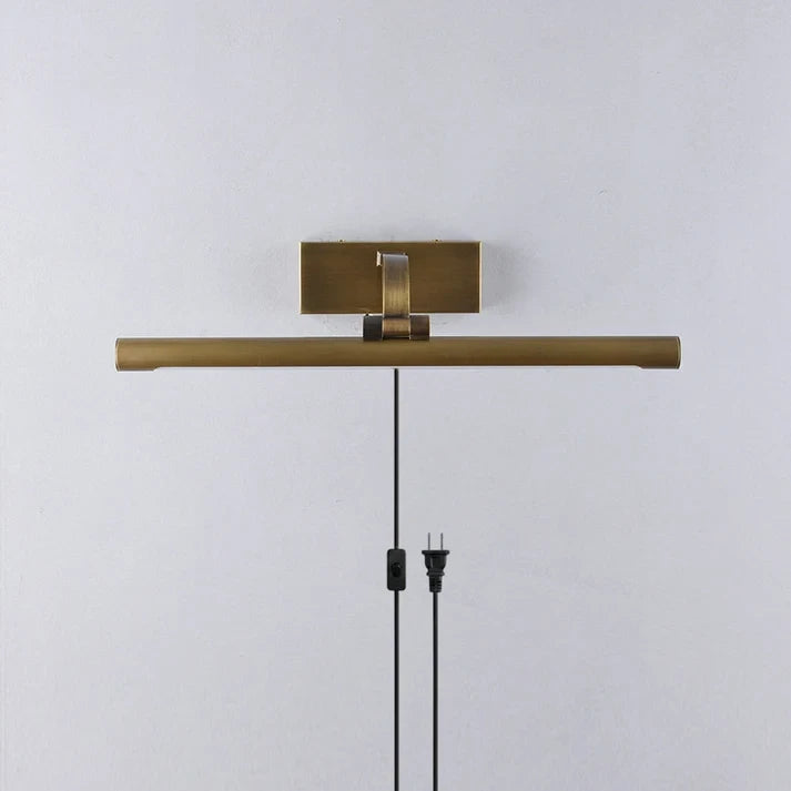Side View of Illuminated Modern Brass Wall Sconce Studio Shot