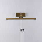 Side View of Illuminated Modern Brass Wall Sconce Studio Shot