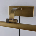 Close Up View of Brass Fixture Arm and Pivot Joint Hardware
