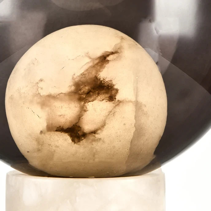 Close Up View of Internal Luminous Sphere and Smoked Grey Glass Texture Details