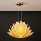Angled View of Illuminated Modern Amber-White Feather Chandelier