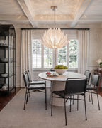 Modern Feather Art Glass Chandelier Over Round Dining Table