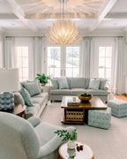 Modern Cascading Amber-White Gradient Chandelier in Bright Living Room